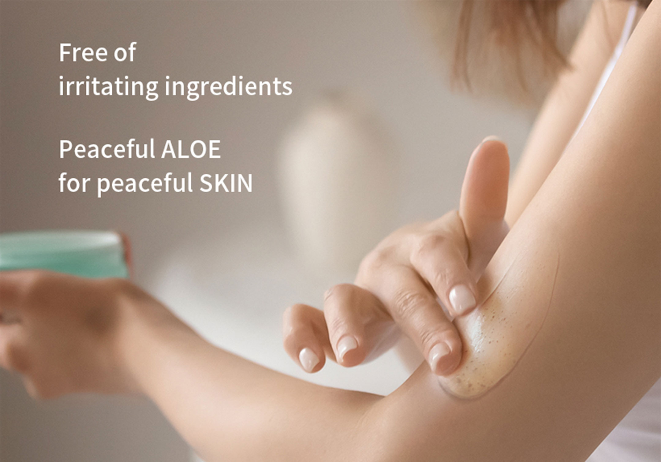 aloe skin demostration on a woman holding the product and applying in her arm